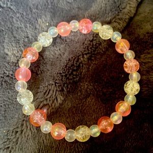 pink and shiny white beads on 0.5mm string